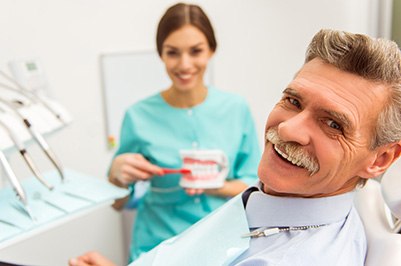 Dentures patient in Putnam smiling